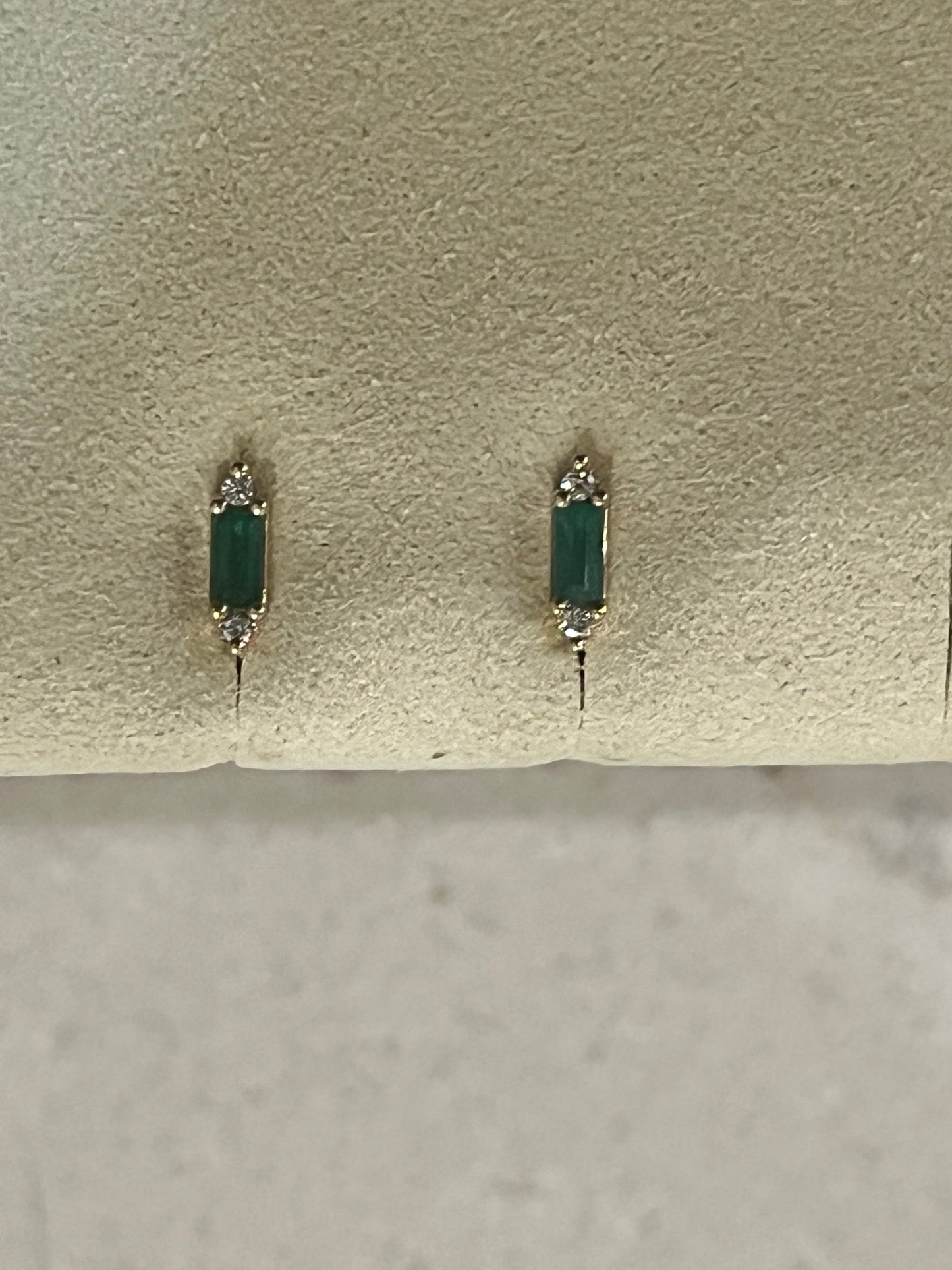 Emerald with White Dimond studs set in 14 carat Gold