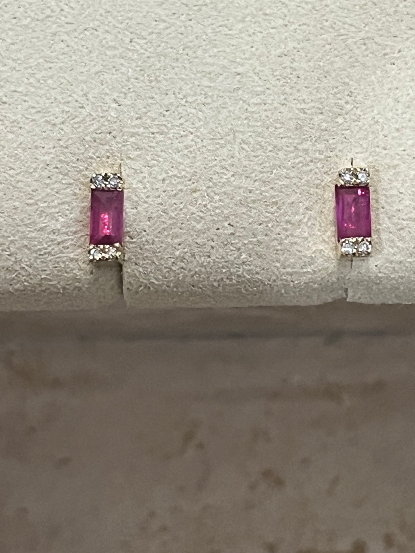 Ruby with White Dimond studs set in 14 carat Gold