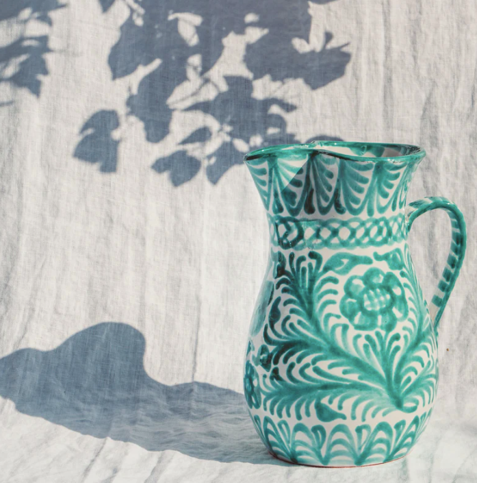 Large pitcher with hand painted designs