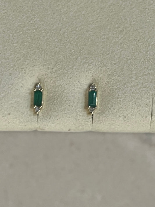 Emerald with White Dimond studs set in 14 carat Gold